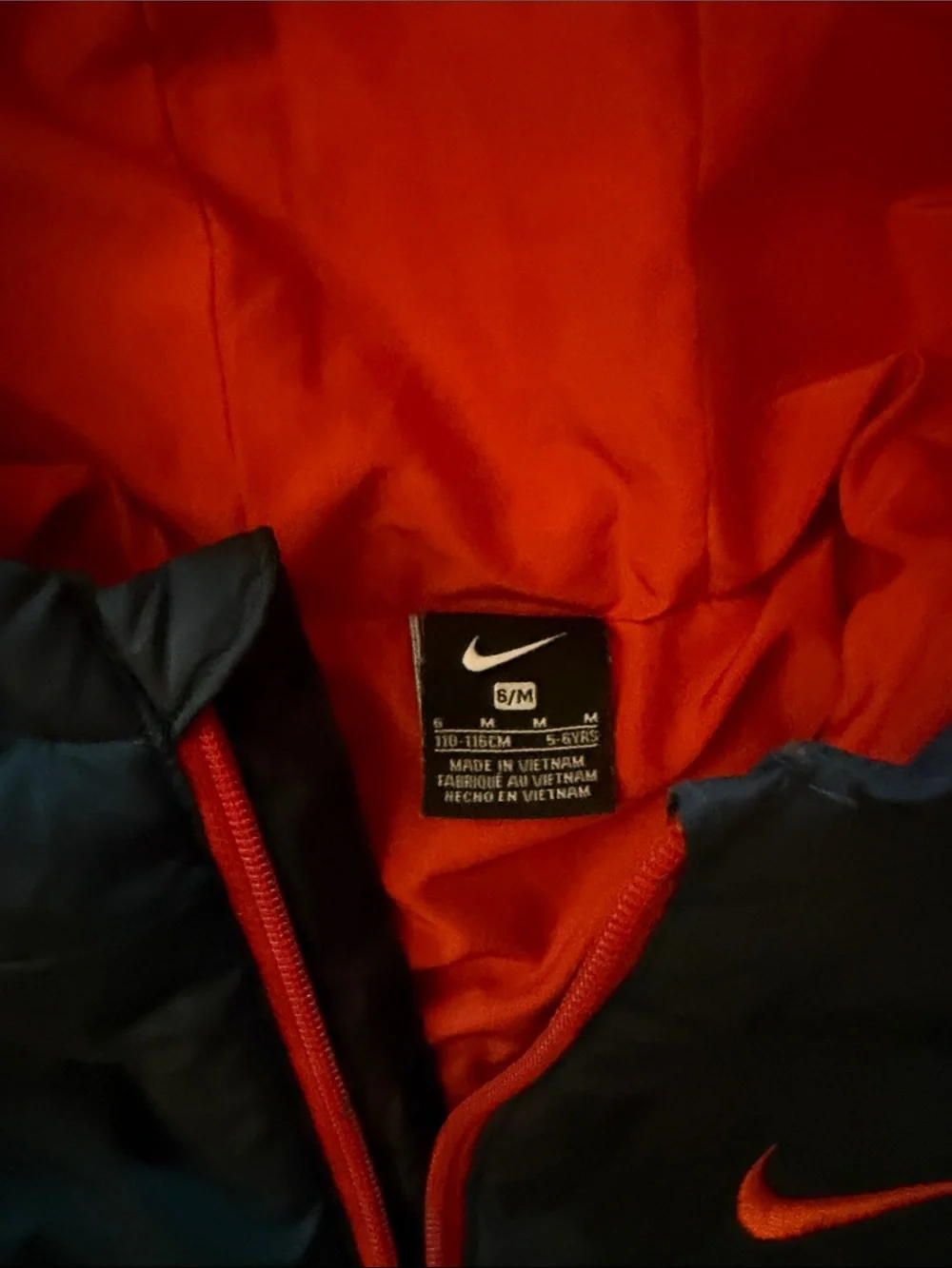 Nike Kids Navy Puffer Jacket with Red Trim and Hood Lining